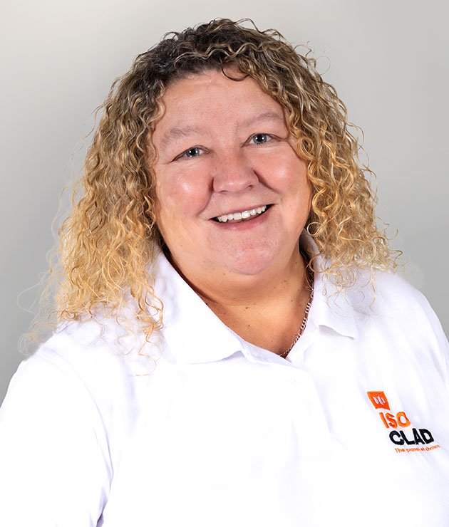 a woman with blonde curly hair smiling